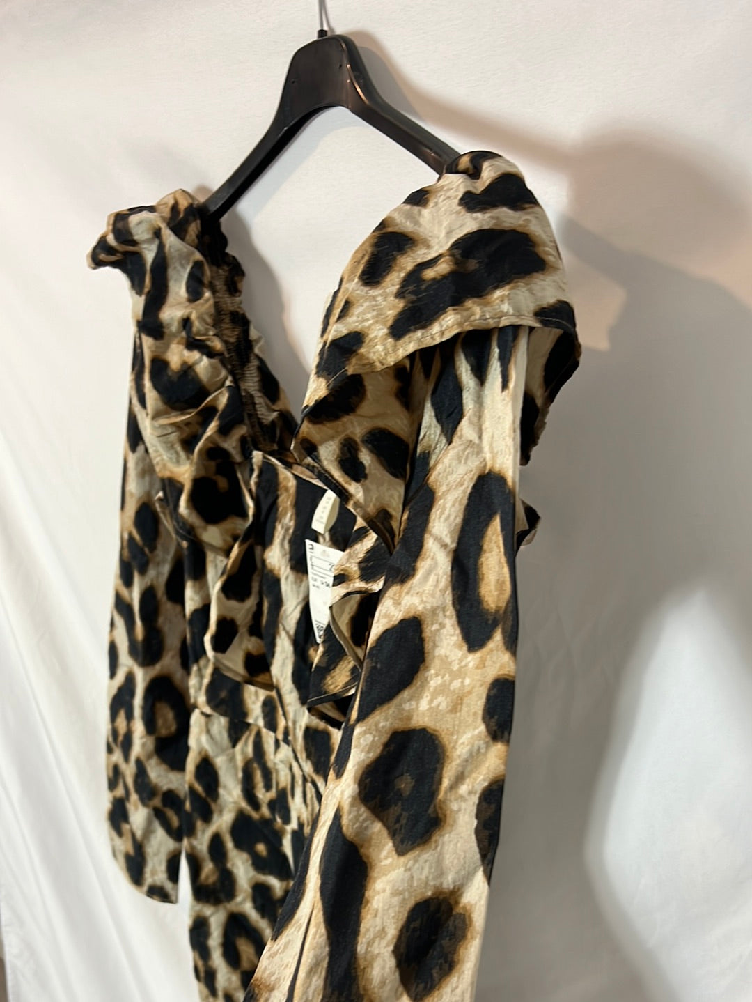 H&M. Vestido corto animal print textura. T S