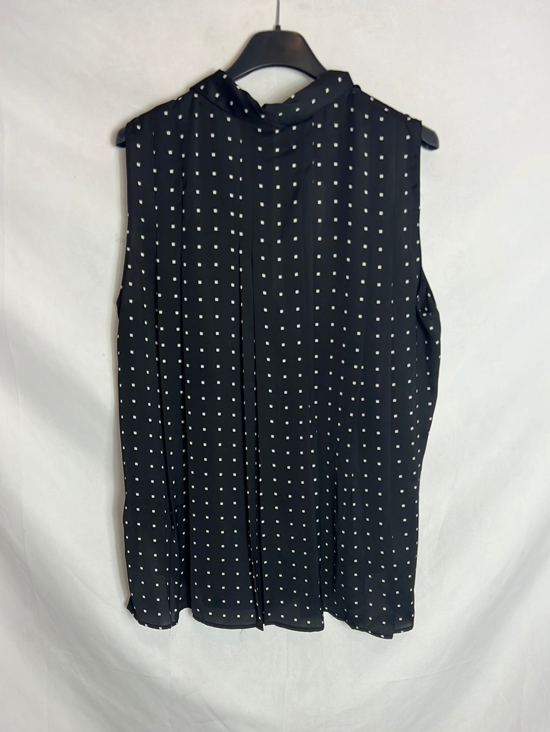 ZARA. Blusa sin mangas negra y blanca. T L