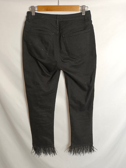 PINKO. Pantalón denim flecos T.38