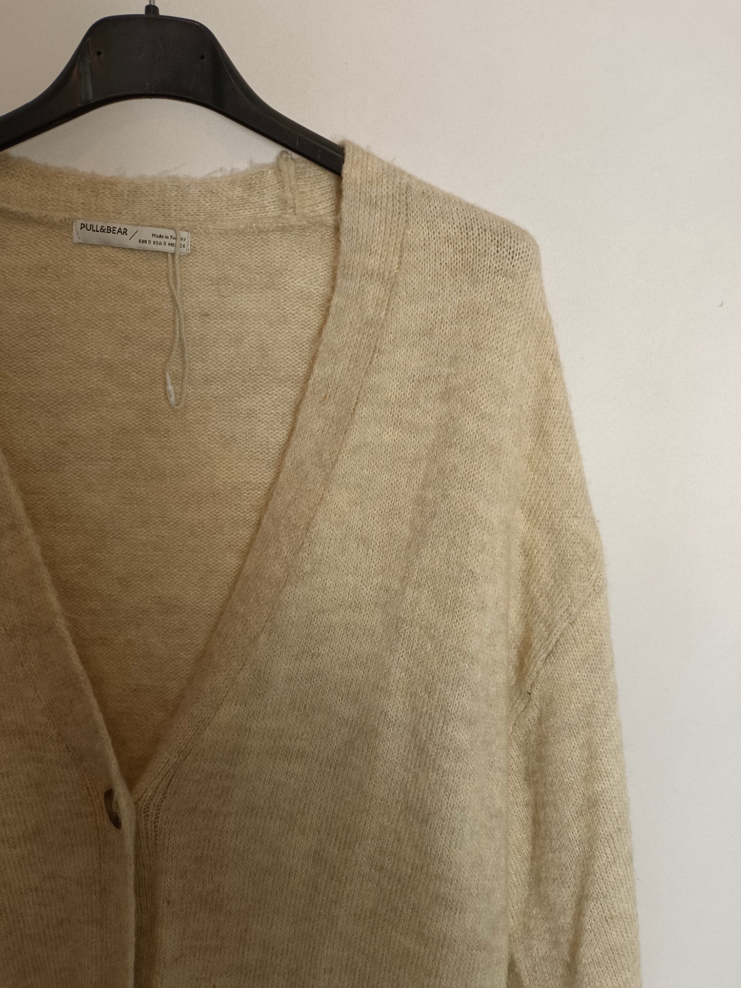 PULL&BEAR. Rebeca beige jaspeada T.s