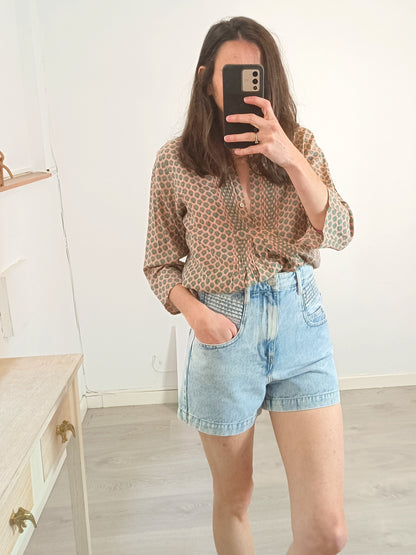 ISABEL MARANT. Shorts denim efecto desgastado  T.36