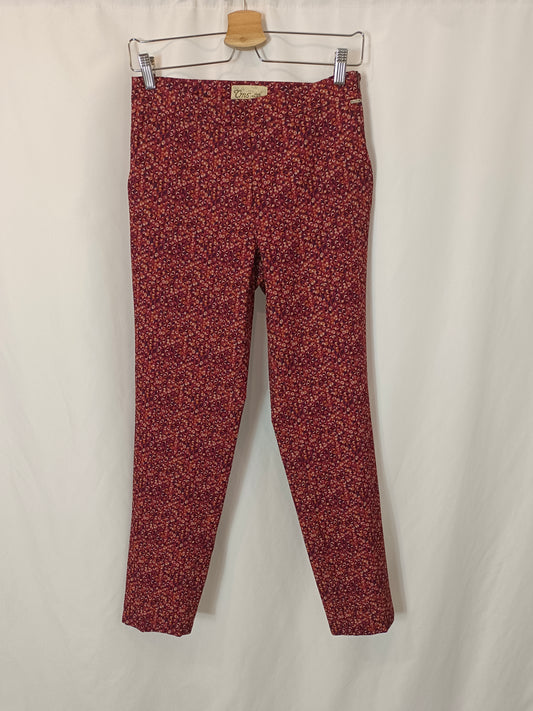 CMS. Pantalón burdeos estampado T.38