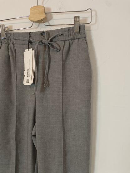 ZARA. Pantalón gris fluido  T.xs