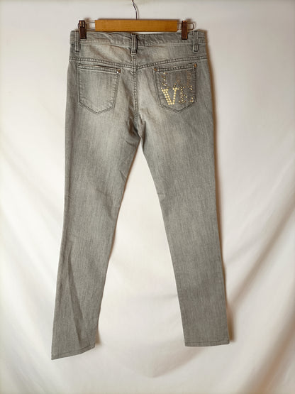 MOSCHINO. Pantalones vaqueros pitillo grises. T 38