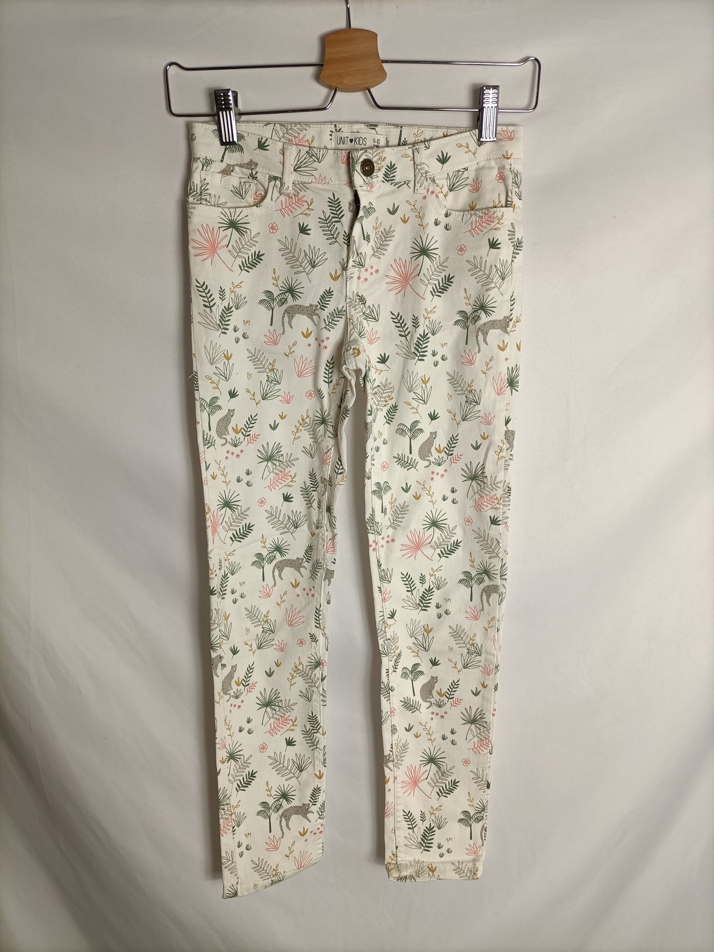 UNIT. Pantalón blanco roto estampado T.9-10 años