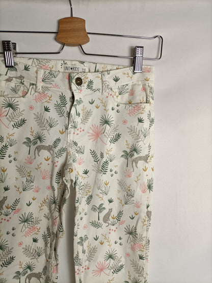 UNIT. Pantalón blanco roto estampado T.9-10 años