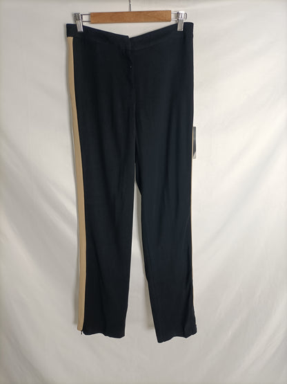 ZARA. Pantalón negros rayas T.xs