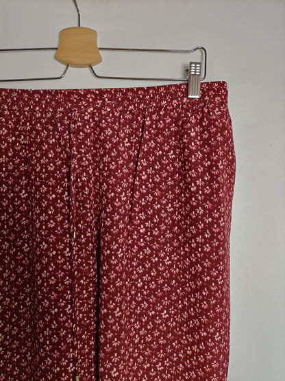 MASSIMO DUTTI. Pantalón burdeos fluido T.40