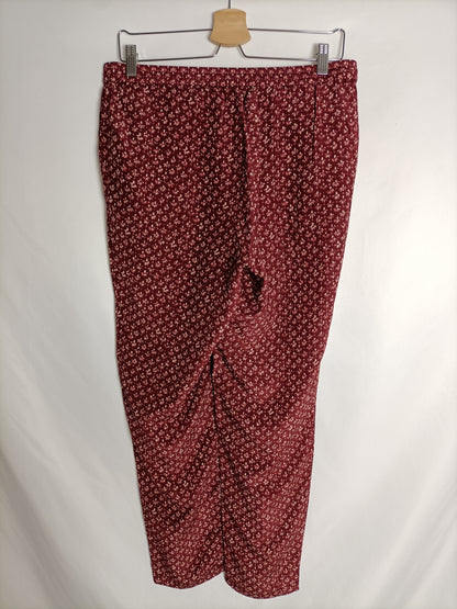 MASSIMO DUTTI. Pantalón burdeos fluido T.40