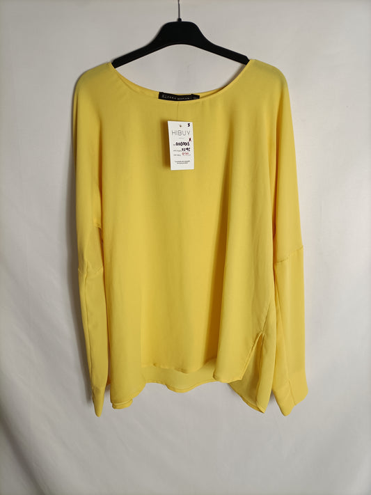 ZARA.Blusa amarilla T.xs