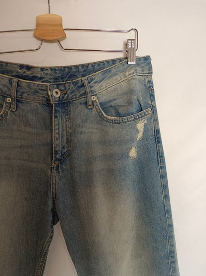 H&M. Pantalón denim rotos T.29(44)