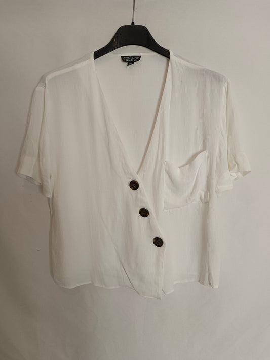 TOPSHOP. Blusa blanca botone T.34(tara)