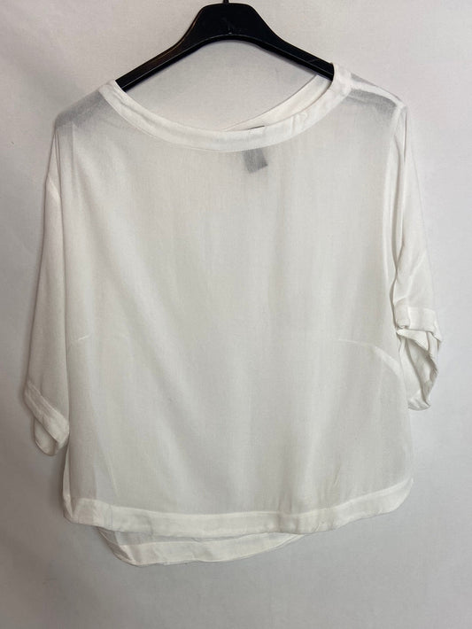 H&M. Top oversized blanco. T.XS