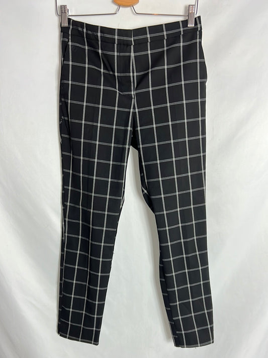 ZARA. Pantalón negro rayas blancas. T M