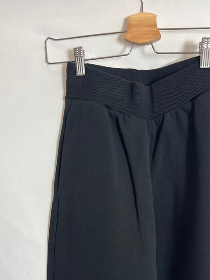 ZARA. Pantalón negro felpa bolsillos. T S