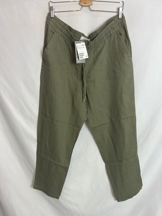 H&M. Pantalón lino verde fluido. T 46