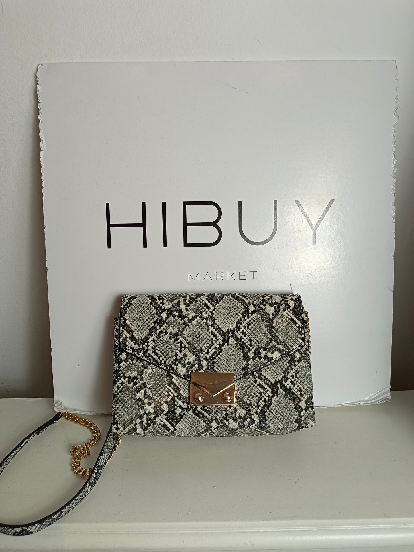 MANGO. Bolso gris animal print