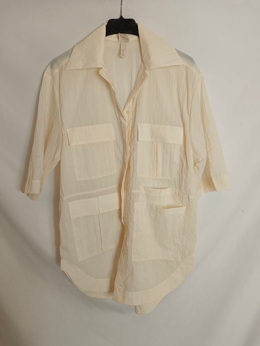 H&M. Camisa beige impermeable T.xs (oversized)