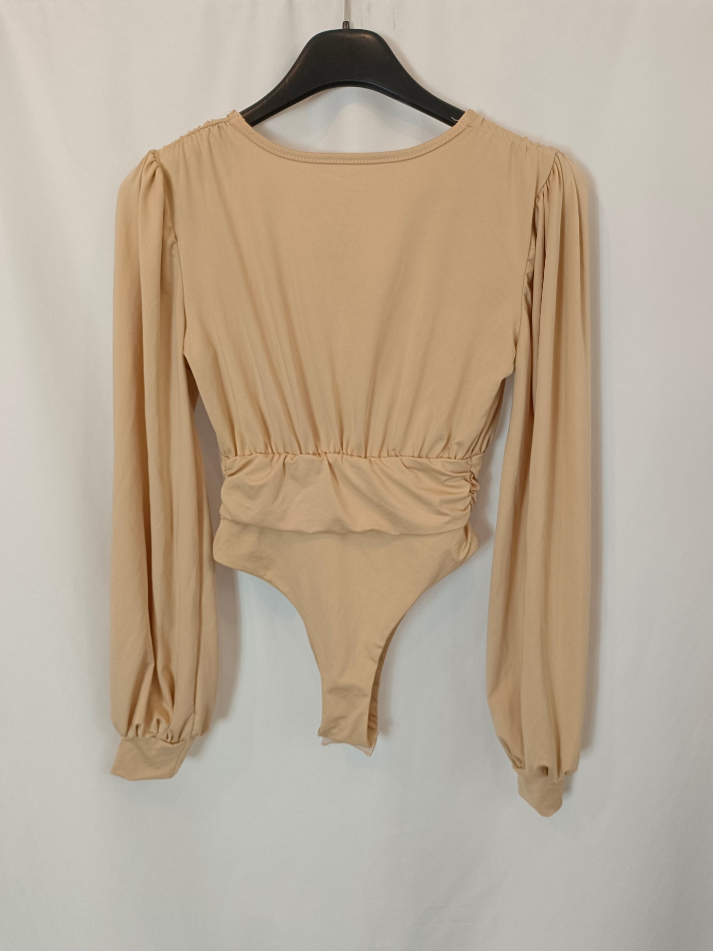 OTRAS. body beige escote T.S