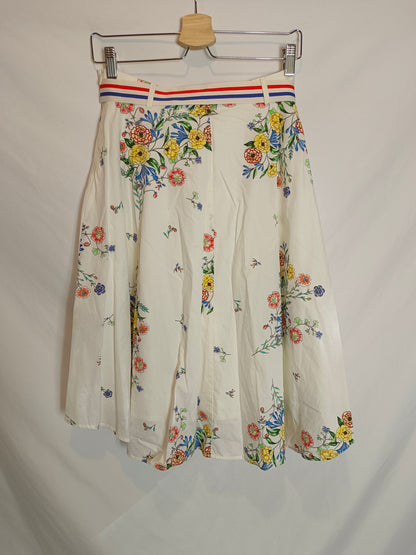 EDC. falda midi flores T.38