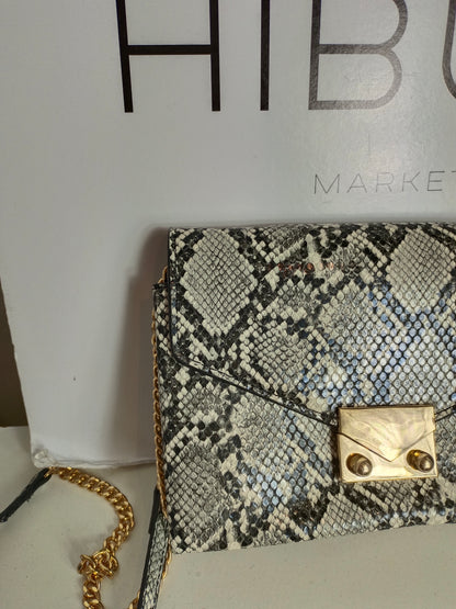 MANGO. Bolso gris animal print