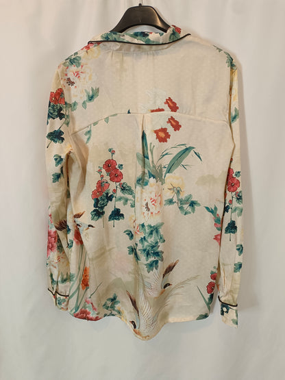 ZARA. Blusa beige estampada T.s