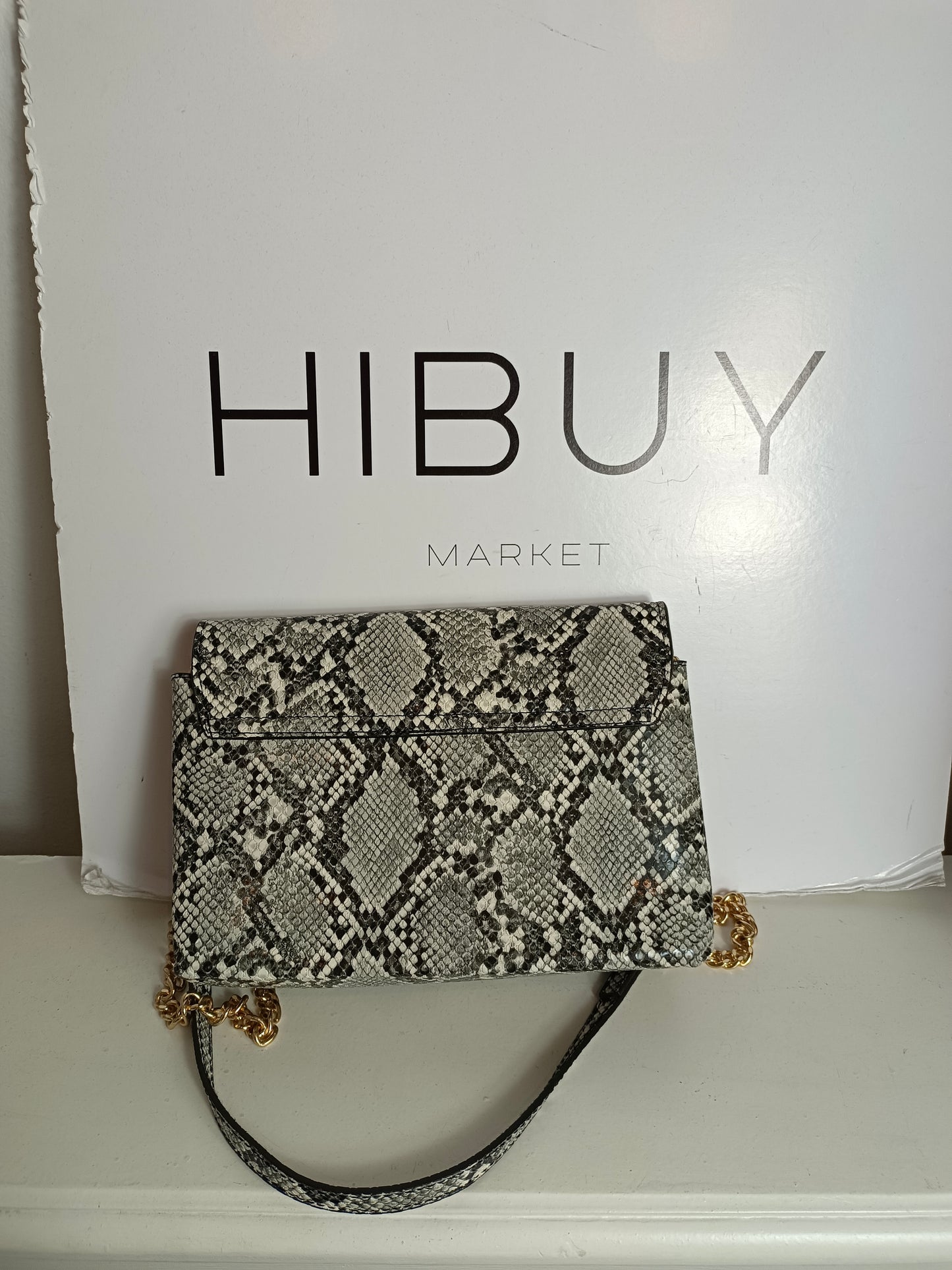 MANGO. Bolso gris animal print