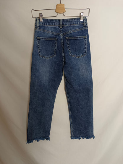 OTRAS. Pantalón denim flecos T.xs