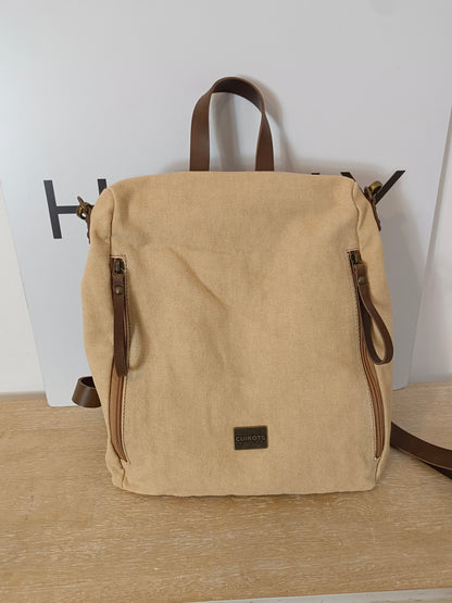 CUIROTS. Mochila lona beige detalles piel