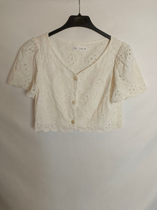 ZARA. Top beige troquelado T.13/14 (xxs)