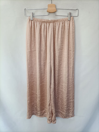 BRANDY MELVILLE. Pantalón culotte rosa T.s