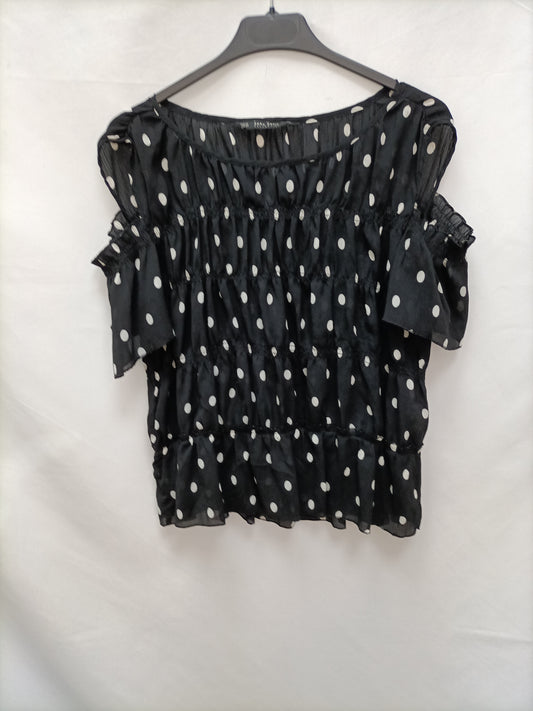 ZARA. Top negro lunares T.xs