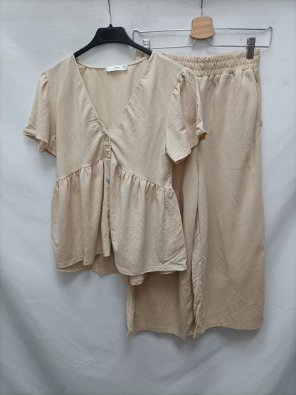 MANGO. Blusa abotonada beige T.xs