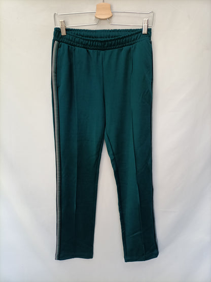 HKM. Pantalón elástico verde T.s