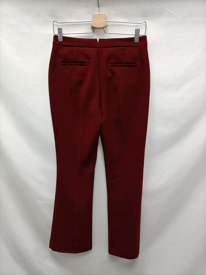 ZARA. Pantalón burdeos de vestir T.xs