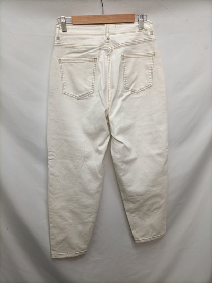 MKT. Pantalón beige costuras T.38