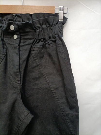 LUMINA. Pantalón negro slouchy T.s