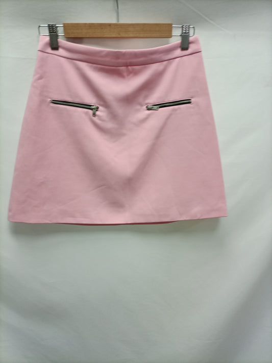 ZARA. Falda corta rosa T.s