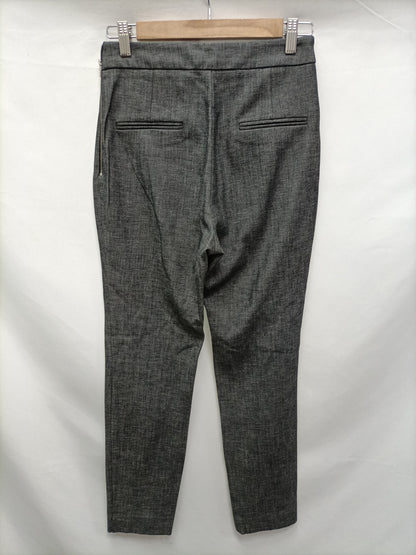 MANGO. Pantalón gris jaspeado T.36