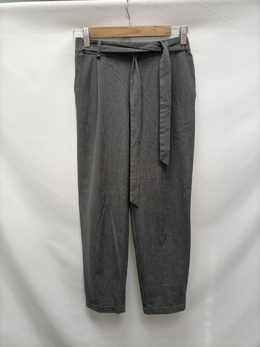 PULL&BEAR. Pantalón fluido gris T.s