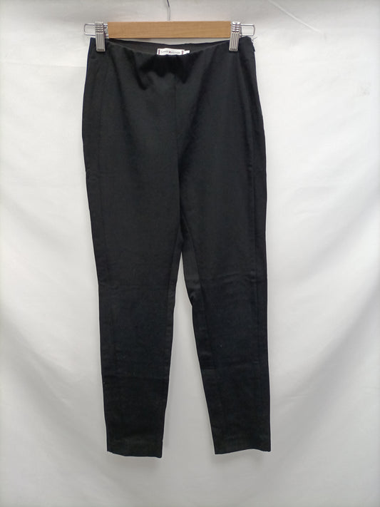 TOMMY HILFIGER. Leggins negros T.32