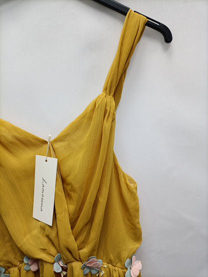 LAMORENA. Top amarillo flores T.s/38