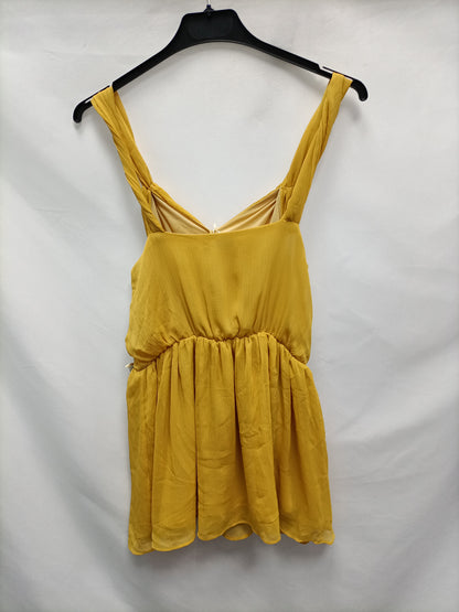 LAMORENA. Top amarillo flores T.s/38