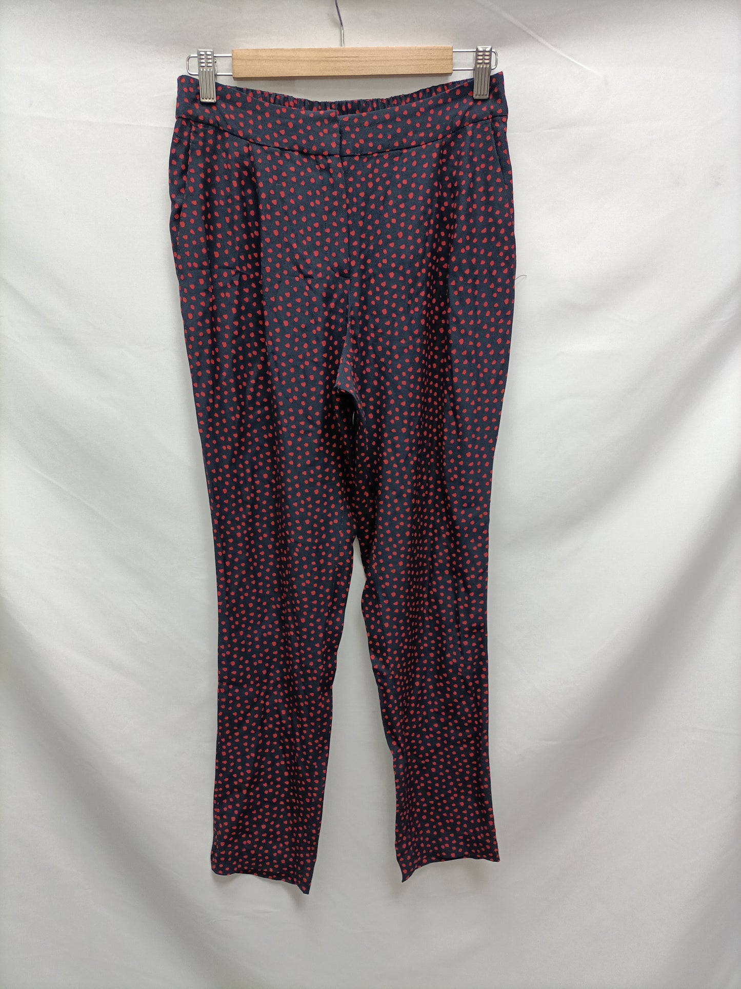 MANGO. Pantalón fluido topitos T.xs