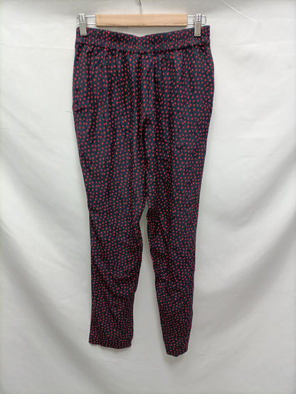 MANGO. Pantalón fluido topitos T.xs