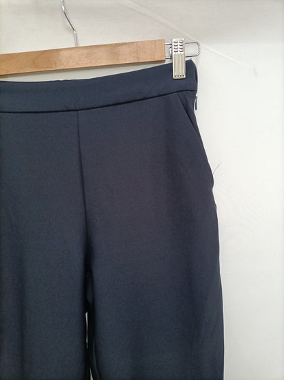 ZARA. Pantalón azul volante T.xs