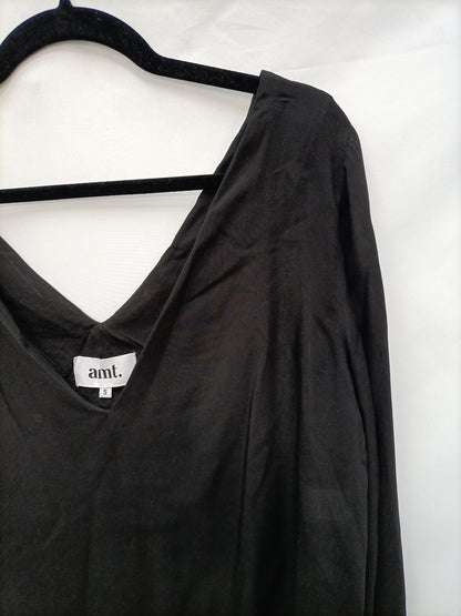 AMT. Blusa negra fluida T.s