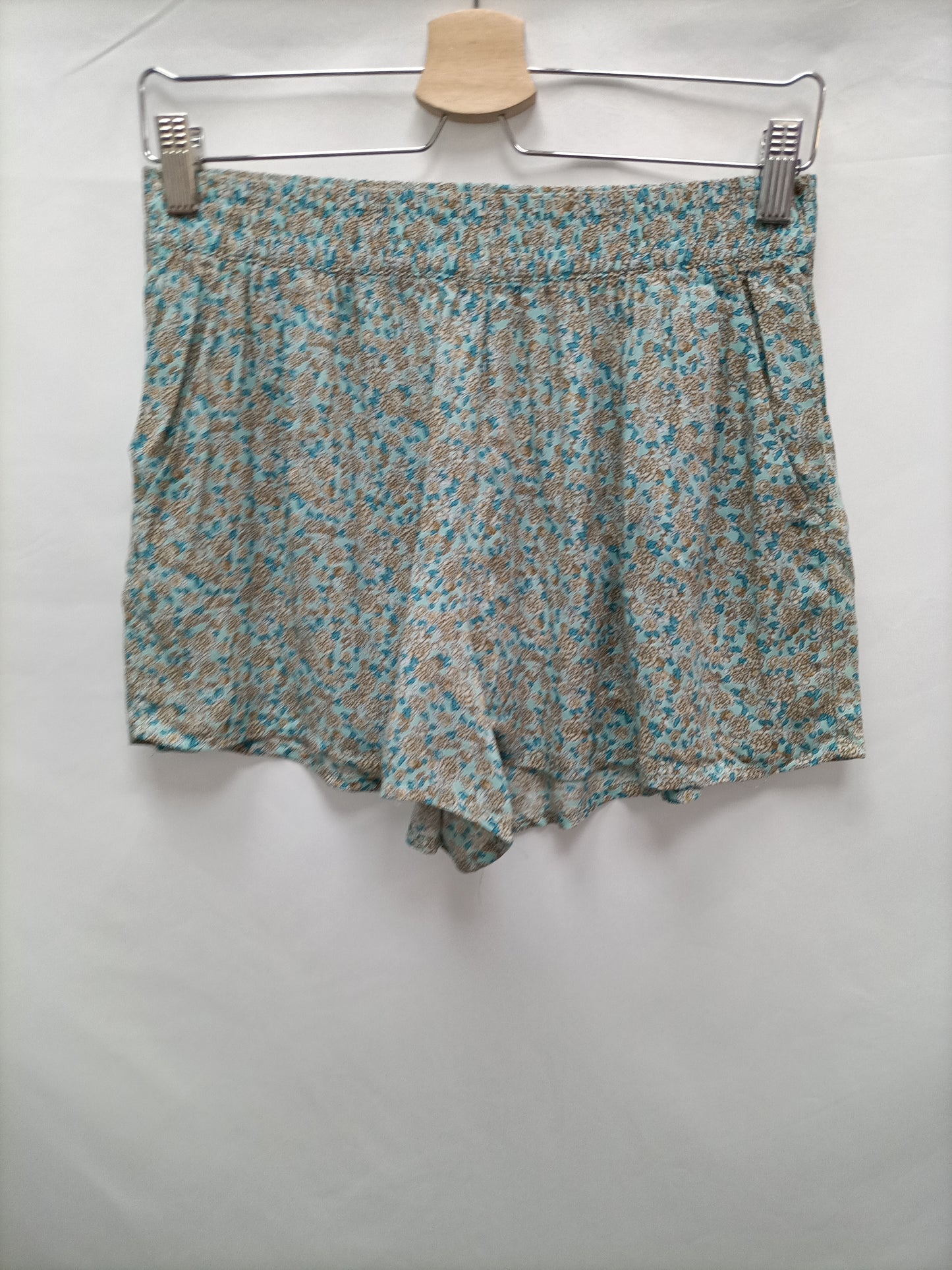 BENETTON. Short azul flores T.m