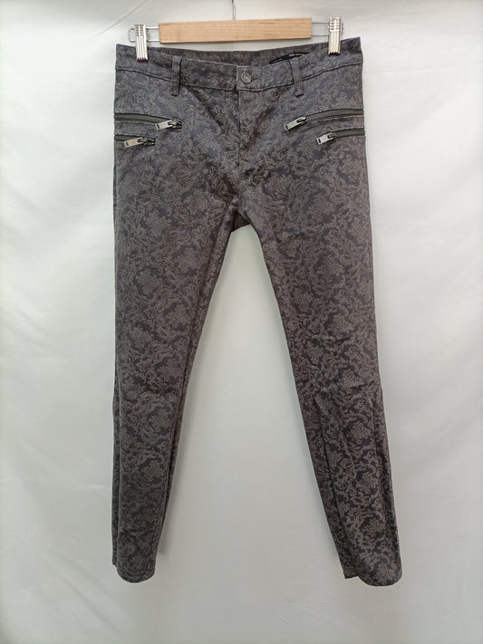 ZARA. Pantalón gris T.36