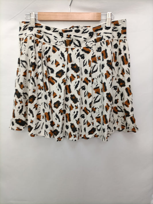 AMICHI.Falda corta animal print